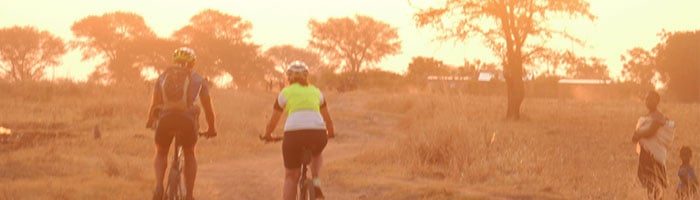 Two Cyclists in Zambia cycling off road