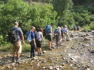 trekking along stream